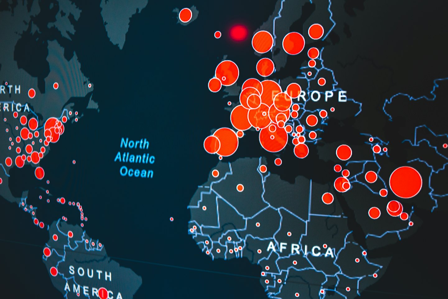 Digital world map displaying network data points across global continents.